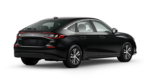 ¾ driver side rear facing view of 2023 Civic Hatchback LX model in Crystal Black Pearl colour