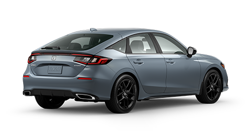 ¾ driver side rear facing view of 2023 Civic Hatchback Sport model in Sonic Grey Pearl colour