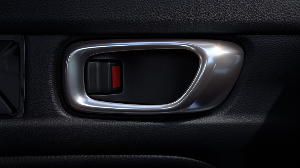 Closeup of interior door handle and lock.