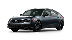 ¾ driver side front facing view of 2023 Civic Hatchback Sport model in Meteoroid Gray Metallic colour