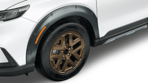 3/4 front bird's eye view of the front fender with fender flares on a white HPD CR-V on white space. 