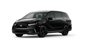 ¾ driver side front facing view of 2023 Odyssey Black Edition model in Crystal Black Pearl colour