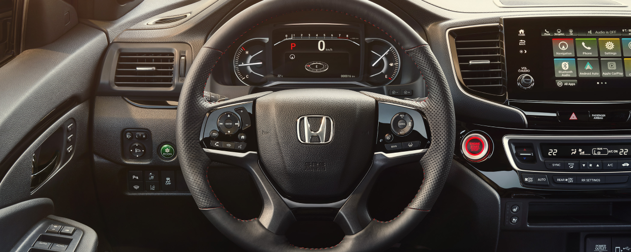 Closeup of steering wheel.