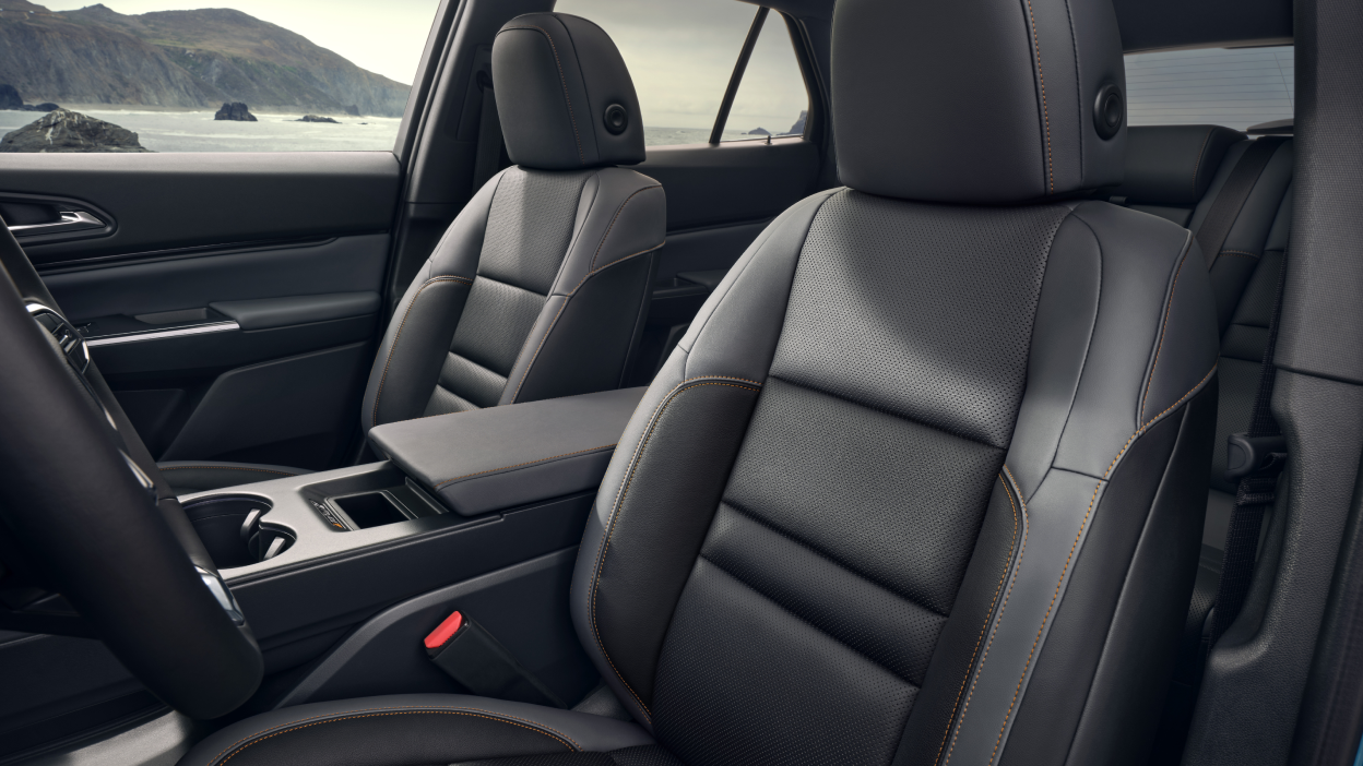 3/4 interior view of the driver and front passenger seats.