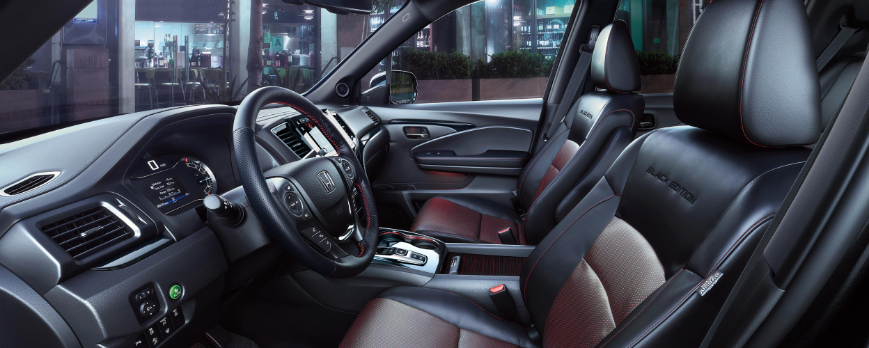Side view of Ridgeline Black Edition’s front seats.