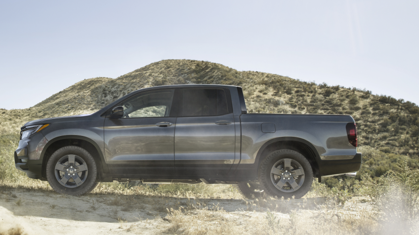 Side view of grey Ridgeline on desert hills.